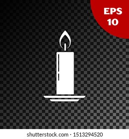 White Burning candle in candlestick icon isolated on transparent dark background. Old fashioned lit candle. Cylindrical candle stick with burning flame.  Vector Illustration