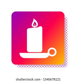 White Burning candle in candlestick icon isolated on white background. Old fashioned lit candle. Cylindrical candle stick with burning flame. Square color button. Vector Illustration