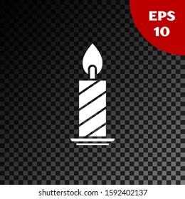 White Burning candle in candlestick icon isolated on transparent dark background. Cylindrical candle stick with burning flame.  Vector Illustration