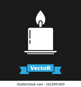 White Burning candle in candlestick icon isolated on black background. Cylindrical candle stick with burning flame.  Vector Illustration