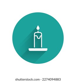 White Burning candle in candlestick icon isolated with long shadow. Cylindrical candle stick with burning flame. Green circle button. Vector