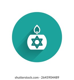 White Burning candle in candlestick with star of david icon isolated with long shadow. Cylindrical candle stick with burning flame. Green circle button. Vector