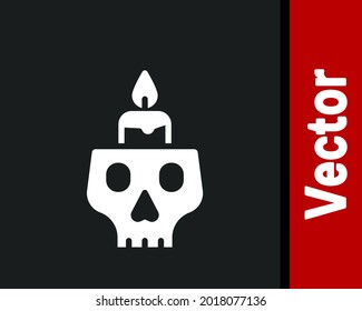 White Burning candle on a skull icon isolated on black background. Day of dead.  Vector