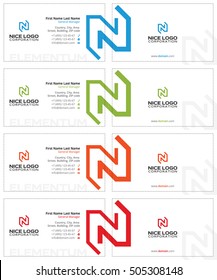white business cards with the letter n colored arrows