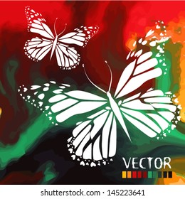 white butterflies on a colorful watercolor background