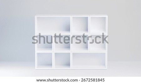 White cabinet with with mixed size empty compartments - modern shelf unit with clean box sections in grid formation for storage, display or organization. Minimalist furniture piece for home, office