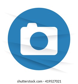 White Camera icon label on wrinkled paper