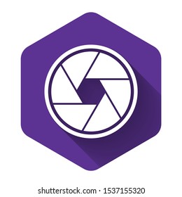 White Camera shutter icon isolated with long shadow. Purple hexagon button. Vector Illustration