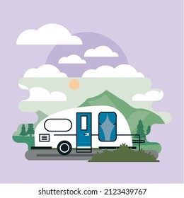 white camper in landscape scene