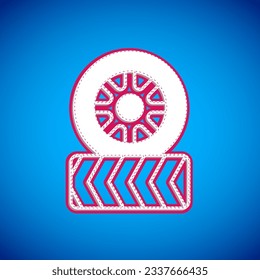 White Car tire wheel icon isolated on blue background.  Vector