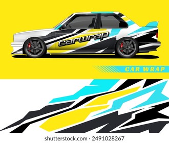 White car with a vibrant yellow, black, and blue design graphic car wrap. Perfect for advertising or showcasing a unique vehicle style.