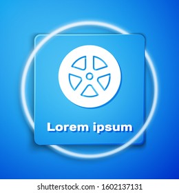 White Car wheel icon isolated on blue background. Blue square button. Vector Illustration