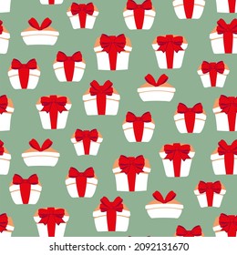 White cartoon gift boxes with red ribbon on a green background. Seamless background gift boxes. Decorative print. Fabric design. Flat design. Vector illustration.