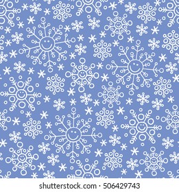 White cartoon snowflake seamless pattern on a blue background. Hand-drawn doodle smiling snowflakes. Vector 10 EPS illustration.