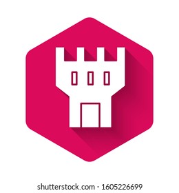 White Castle tower icon isolated with long shadow. Fortress sign. Pink hexagon button. Vector Illustration