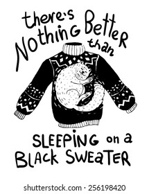 White cat sleeping on a black sweater