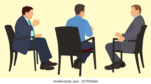 White or Caucasian American Businessman Sitting in Chairs Having a Meeting