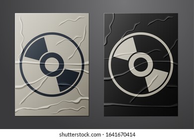 White CD or DVD disk icon isolated on crumpled paper background. Compact disc sign. Paper art style. Vector Illustration