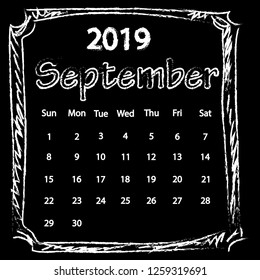White Chalk drawing doodles frame calendar of 2019 year September on black board