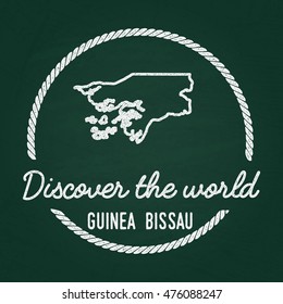 White chalk texture hipster insignia with Republic of Guinea-Bissau map on a green blackboard. Grunge rubber seal with country outlines, vector illustration.