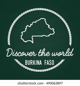 White chalk texture hipster insignia with Burkina Faso map on a green blackboard. Grunge rubber seal with country outlines, vector illustration.