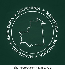 White chalk texture rubber seal with Islamic Republic of Mauritania map on a green blackboard. Grunge rubber seal with country outlines, vector illustration.