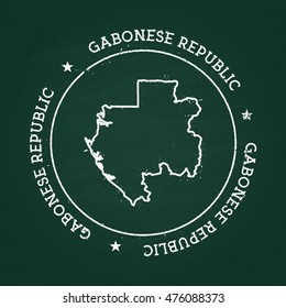 White chalk texture rubber seal with Gabonese Republic map on a green blackboard. Grunge rubber seal with country outlines, vector illustration.