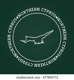 White chalk texture rubber seal with Turkish Republic of Northern Cyprus map on a green blackboard. Grunge rubber seal with country outlines, vector illustration.