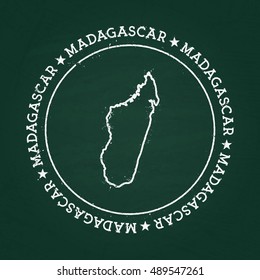 White chalk texture rubber seal with Republic of Madagascar map on a green blackboard. Grunge rubber seal with country outlines, vector illustration.