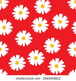 
White chamomile flower on a red seamless background, pattern for textiles.