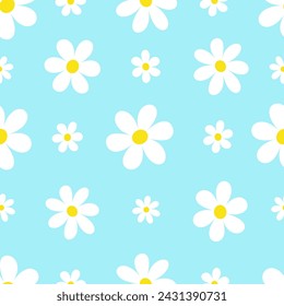 White chamomile flowers on blue background seamless pattern