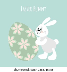 White cheerful bunny with a large Easter egg. Happy easter. Design elements for cards, flyers, banners.