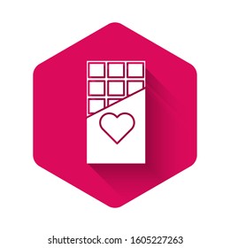 White Chocolate bar icon isolated with long shadow. Valentines day symbol. Pink hexagon button. Vector Illustration