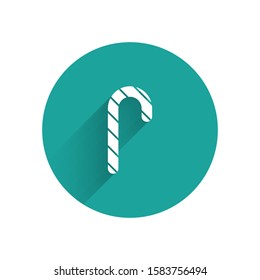 White Christmas candy cane with stripes icon isolated with long shadow. Merry Christmas and Happy New Year. Green circle button. Vector Illustration