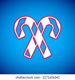 White Christmas candy cane with stripes icon isolated on blue background. Merry Christmas and Happy New Year.  Vector