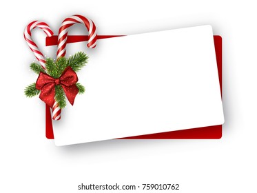 White Christmas card with candy canes and bow. Vector paper illustration.