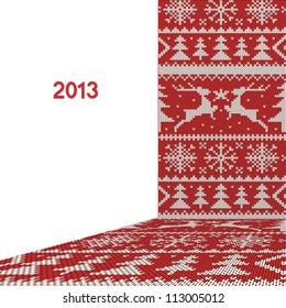 White christmas ornament on red background. New year knitted fabric