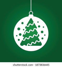 White Christmas toy with tree on a green background