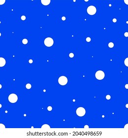 White circles on a blue background.Pattern for clothing, textiles, fabric, packaging paper, ceramics, background.