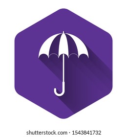 White Classic elegant opened umbrella icon isolated with long shadow. Rain protection symbol. Purple hexagon button. Vector Illustration