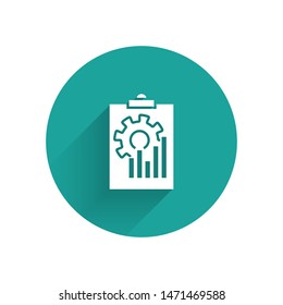 White Clipboard with graph chart icon isolated with long shadow. Report text file icon. Accounting sign. Audit, analysis, planning. Green circle button. Vector Illustration