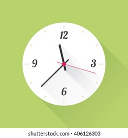 white clock on a green background