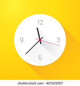 white clock on yellow wall
