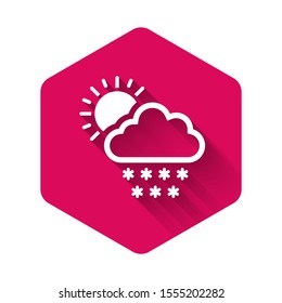 White Cloud with snow and sun icon isolated with long shadow. Cloud with snowflakes. Single weather icon. Snowing sign. Pink hexagon button. Vector Illustration