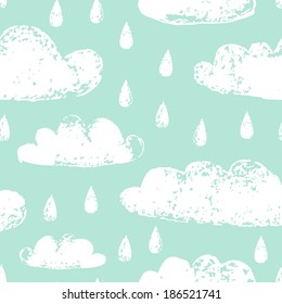 White clouds and raindrops grunge prints on teal blue sky seamless pattern, vector