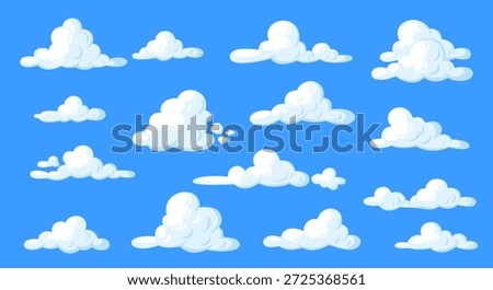 White clouds set on blue background. Fluffy cloudscape