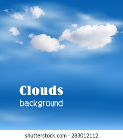 White clouds in the sky on blue background