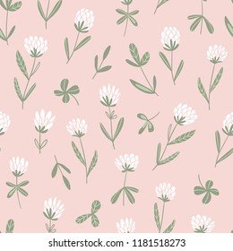 White clover flowers.  Vector floral seamless pattern. Cute hand-drawn  pattern design for fabric, wallpaper or wrap paper.