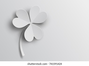 White clover leaf in paper cut and St. Patrick's Day background