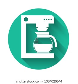 White Coffee machine with glass pot icon isolated with long shadow. Green circle button. Vector Illustration